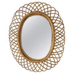 Italian mid-century modern Oval wall mirror in rattan, 1960s