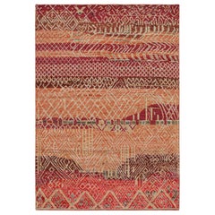 Alfombra de estilo marroquí Rug & Kilim con motivos geométricos en rojo, naranja y marrón beige