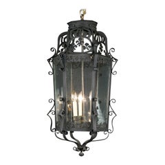Used French 19th Century Iron Hanging Lantern with Groups of Fleur De Lis at Top