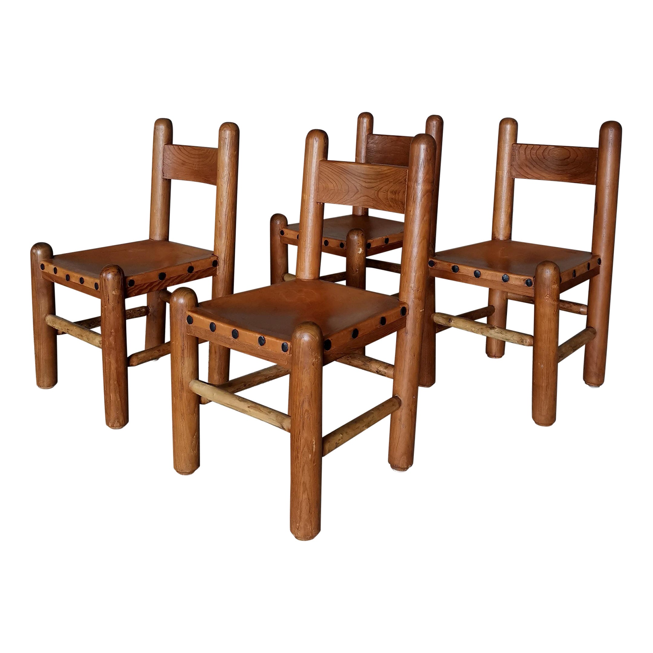 Set of 4 Brutalist and Sculptural dining chairs in the style of Charles Dudouyt For Sale