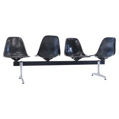 Tandem shell seating system by Ray and Charles Eames for Herman Miller