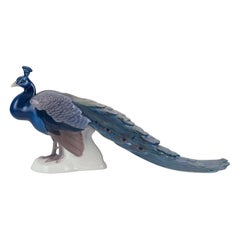 Bing & Grøndahl, large porcelain figurine of a peacock. From the 1920s/30s. 