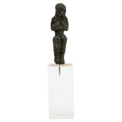 A Greek Solid Cast Bronze Figure of Kouros, Circa 1st millenium BC