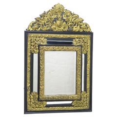 Antique Dutch Looking Glass of Ebony and Brass Repoussé