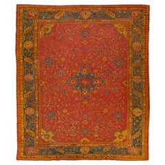 Antique Turkish 1880s Oushak Red Wool Rug Handmade with Allover Floral Motif