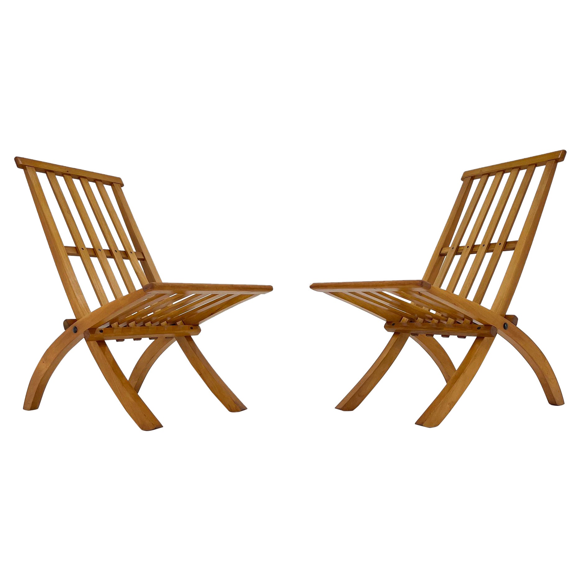 A set of two folding chairs made of beech wood designed by arch. Otto Rothmayer For Sale
