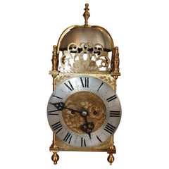 Horloge lanterne en laiton du 18e siècle
