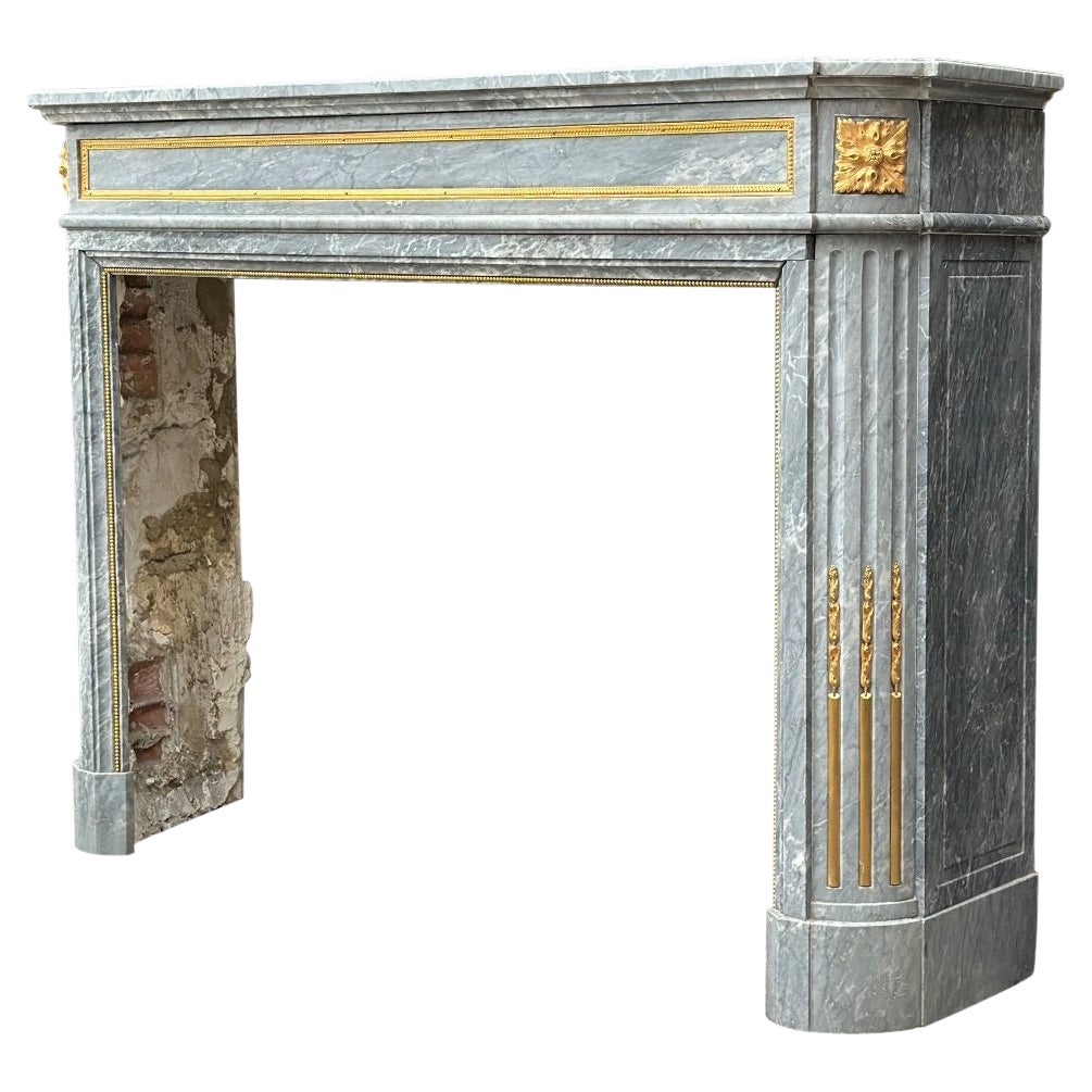 Louis XVI Style Marble Mantel Circa 1880 With Gilded Bronze For Sale