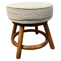 Bamboo Rattan Wicker Swivel Footstool in the Paul Frankl's Style. Circa 1970s