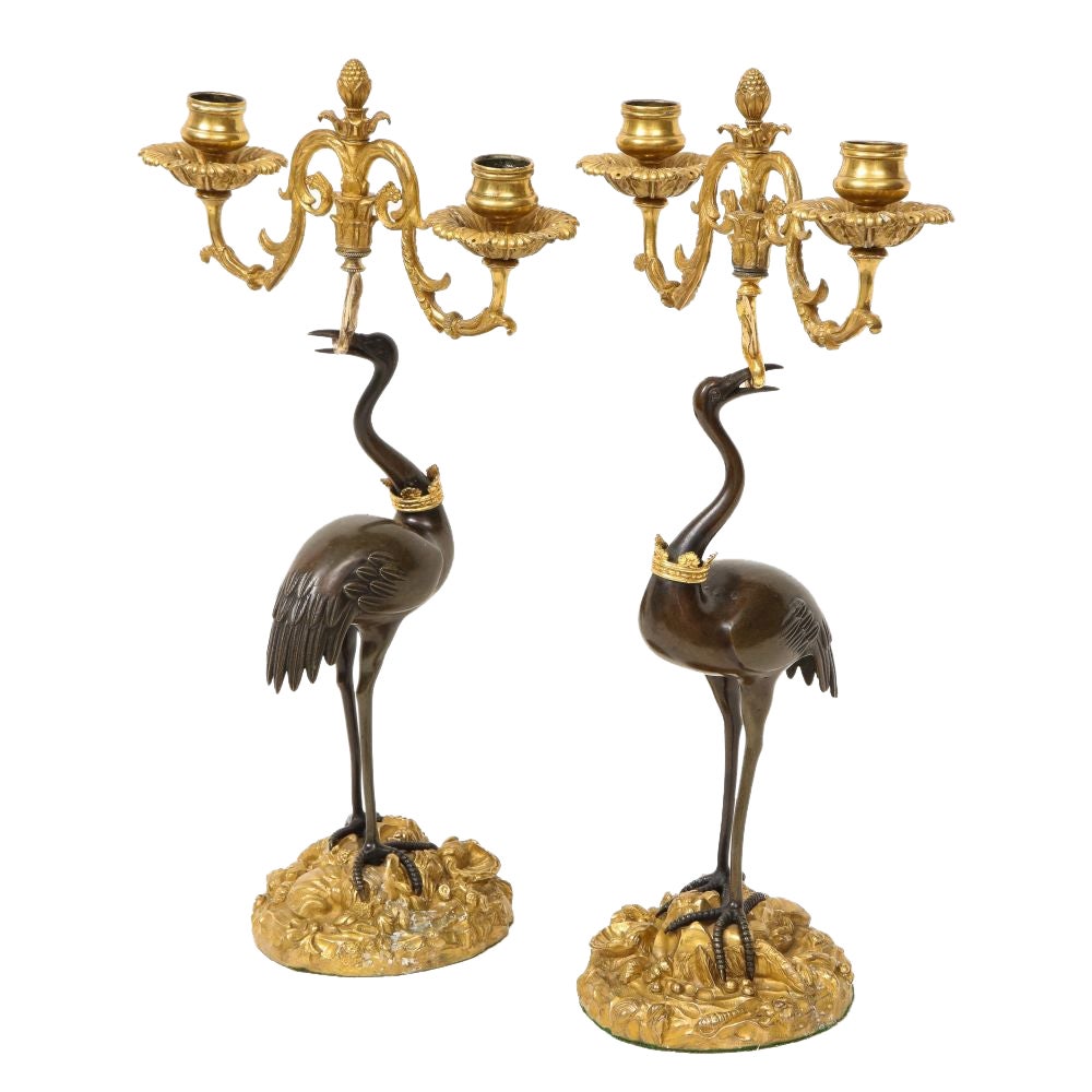 Pair of Regency Patinated and Gilt Bronze Ostrich-Form Two Light Candelabra