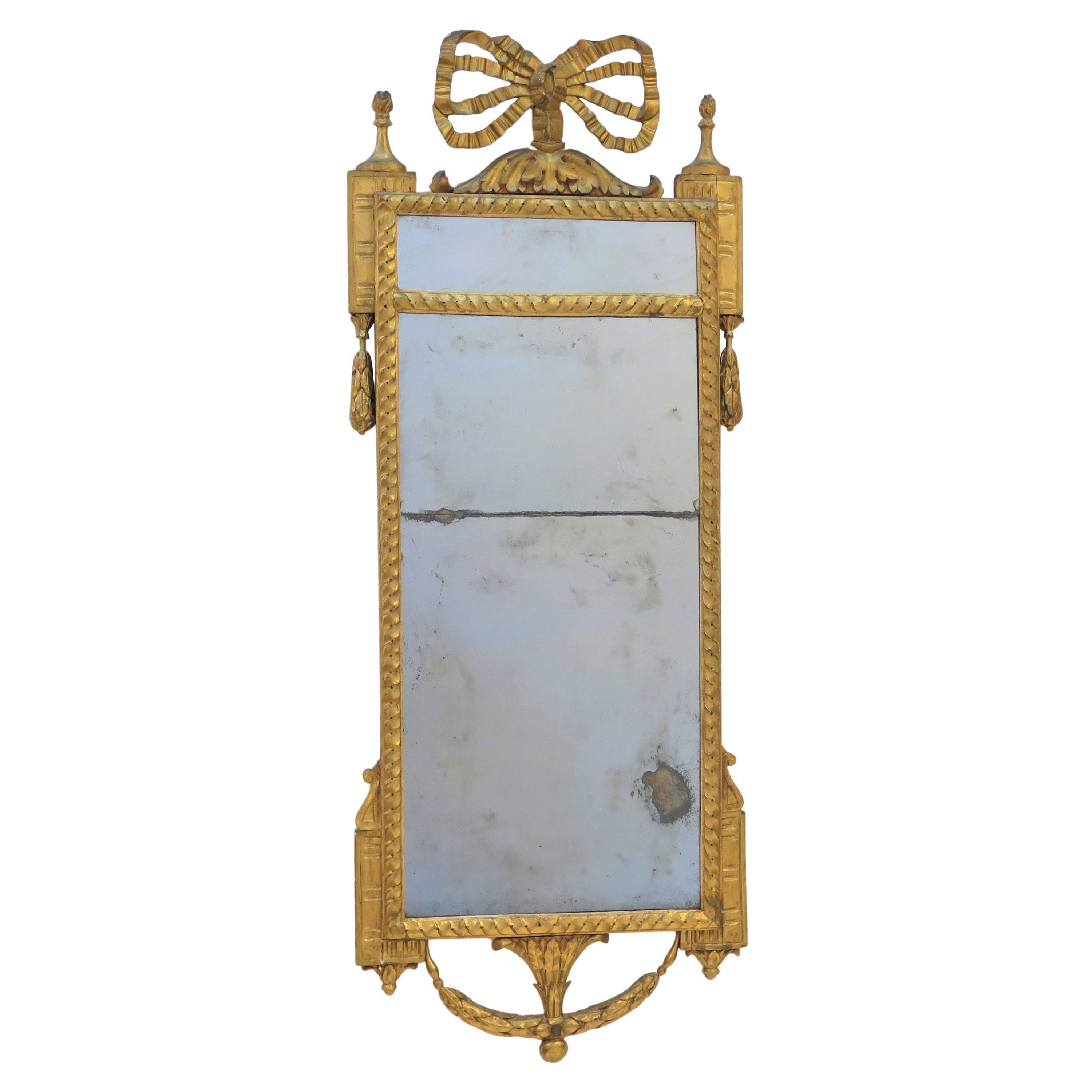 An Italian Neoclassical Carved Giltwood Pier Glass Mirror