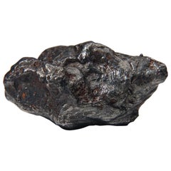 Genuine Sikhote-Alin Meteorite on Acrylic Stand (99.5 grams)