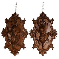 Pair of 19th Century Swiss Black Forest Carved Walnut Hunt Trophies Sculptures