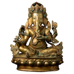Mid-20th century old bronze Nepali Ganesha statue with gold fire gilded 