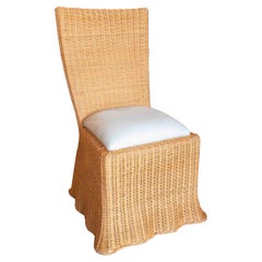 Wicker Chair with Wavy Shapes and White Cushion