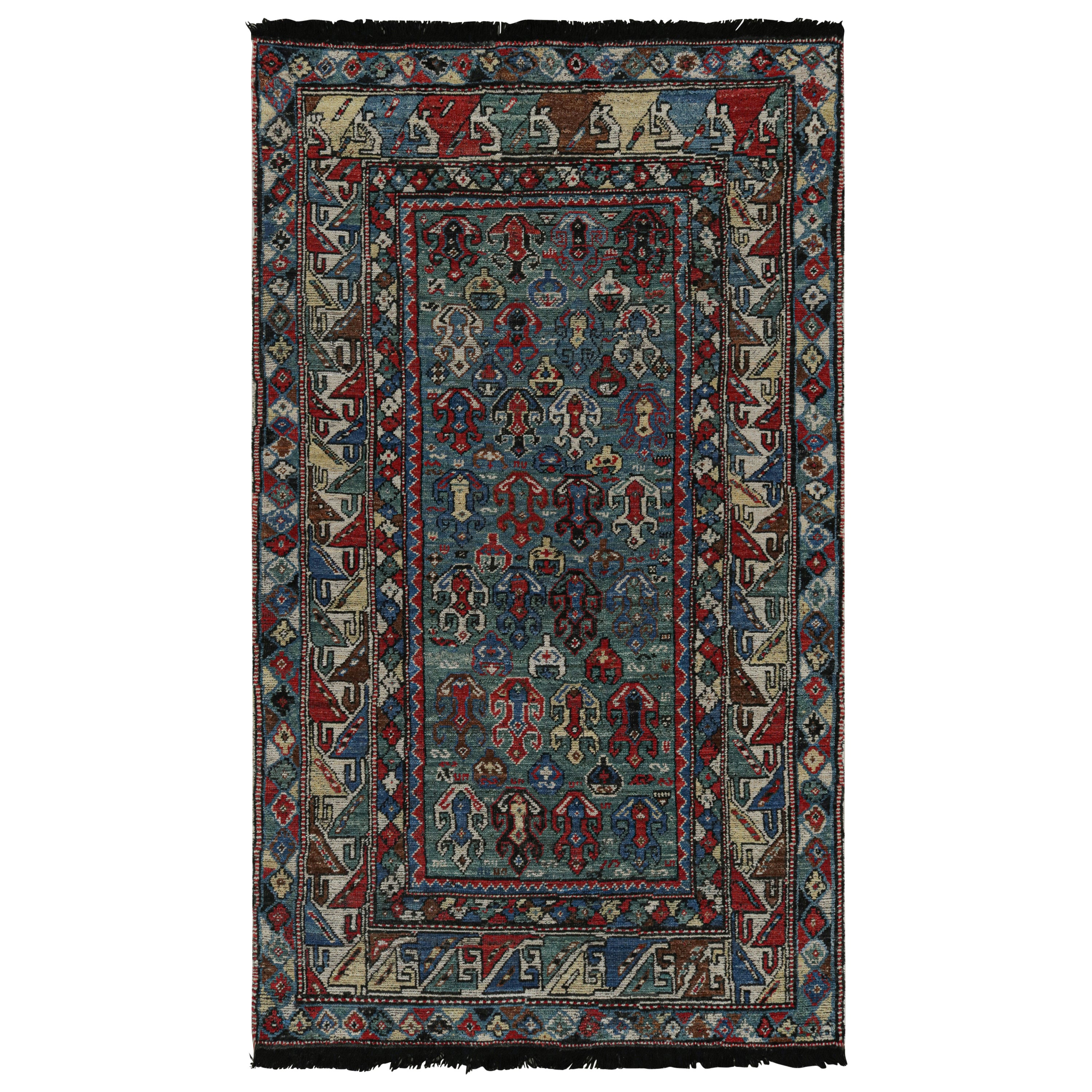 Tapis de style tribal de Rug & Kilim à motifs géométriques verts, bleus et rouges