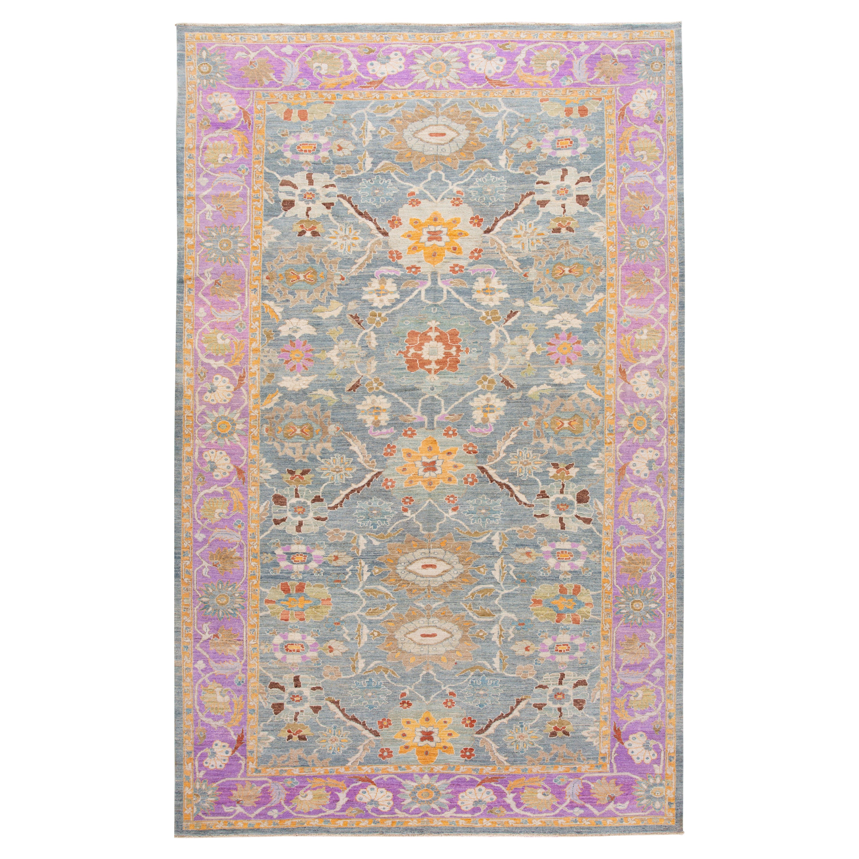 The Modernsabad Handmade Floral Motif Blue & Purple Wool Rug (Tapis de laine bleu et violet) en vente