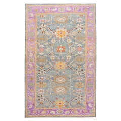 The Modernsabad Handmade Floral Motif Blue & Purple Wool Rug (Tapis de laine bleu et violet)