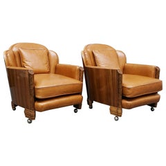 A Pair of Burr Walnut and Leather Art Deco Lounge Chairs by Maurice Adams
