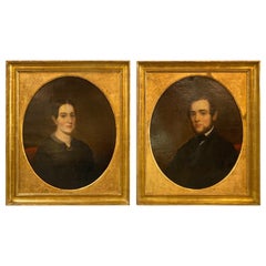 Une paire de  Portraits américains anciens d'une couple aristocrate