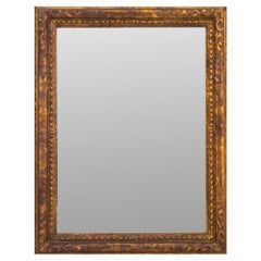 Miroir en bois doré de style baroque