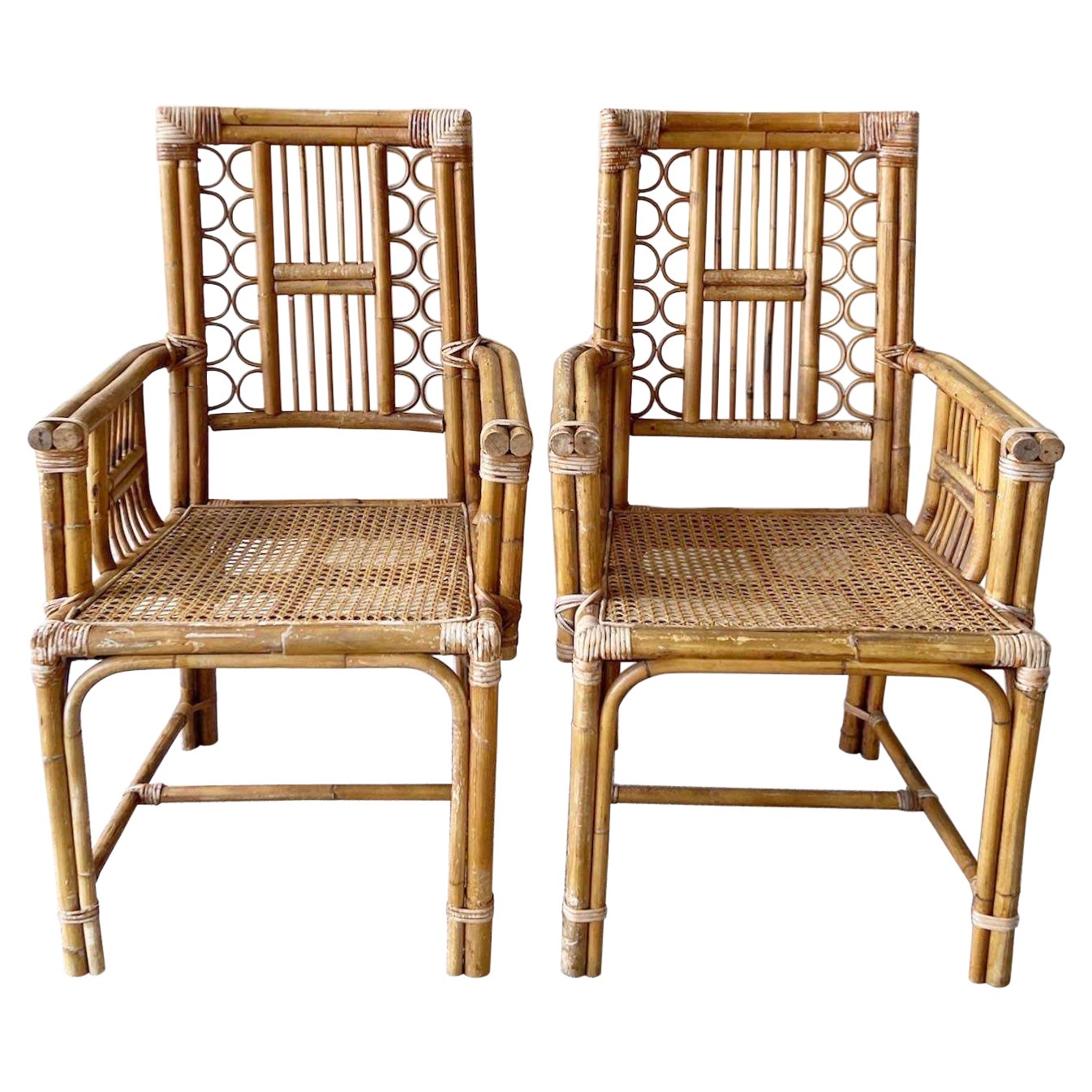 Boho Chic Bamboo Rattan and Cane Dining Chairs Attributed to Brighton - a Pair For Sale