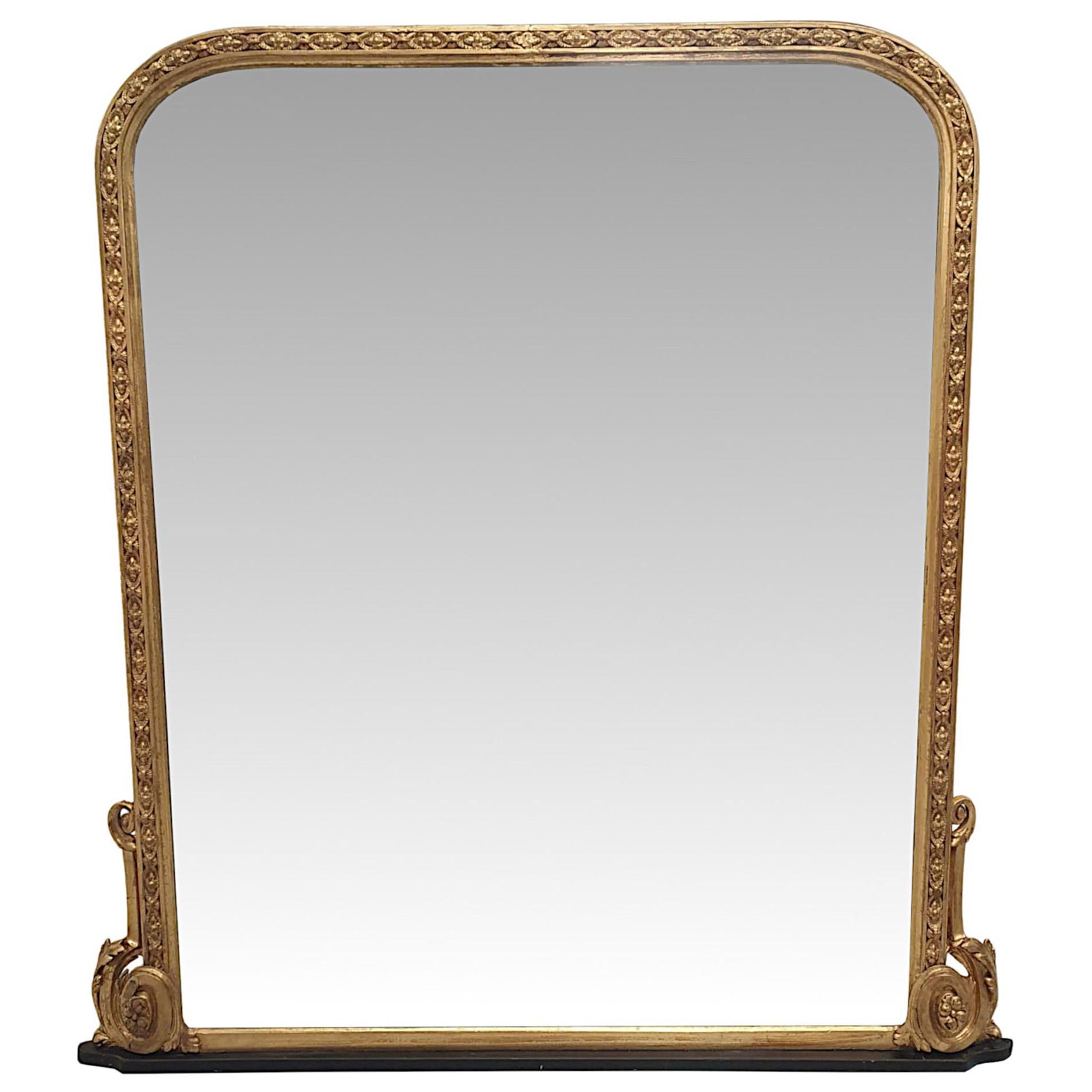 A Gorgeous 19th Century Giltwood Overmantle Mirror For Sale