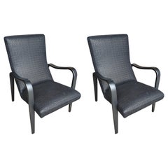 Retro pair of fully refurbished mid-century arm chairs in custom woven leather