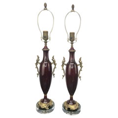 Paar französische Bronze- Ochsenblut-Lampen