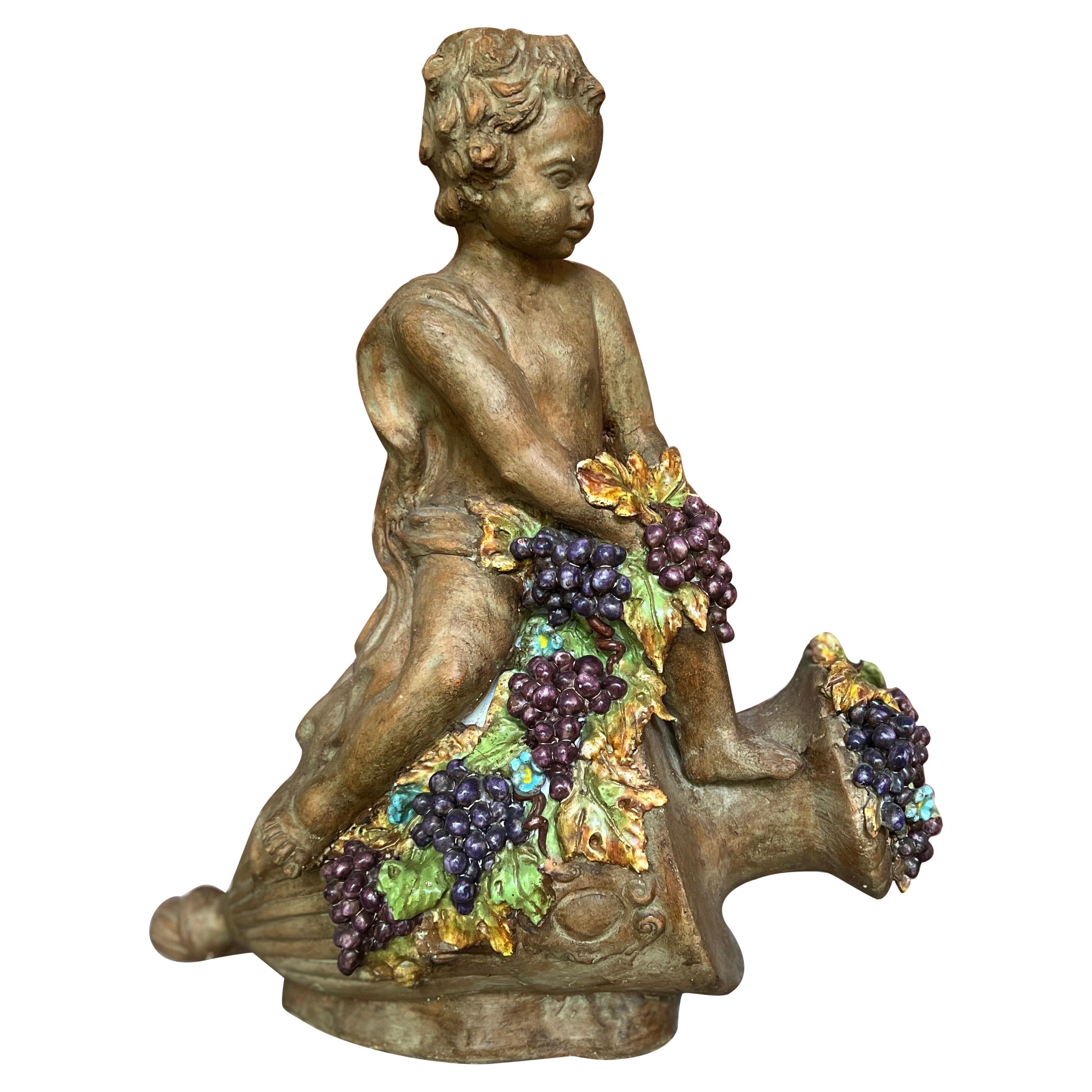 Large Italian Terracotta Putti & Grape Vine Adorning a Wine Vessel Sculpture For Sale