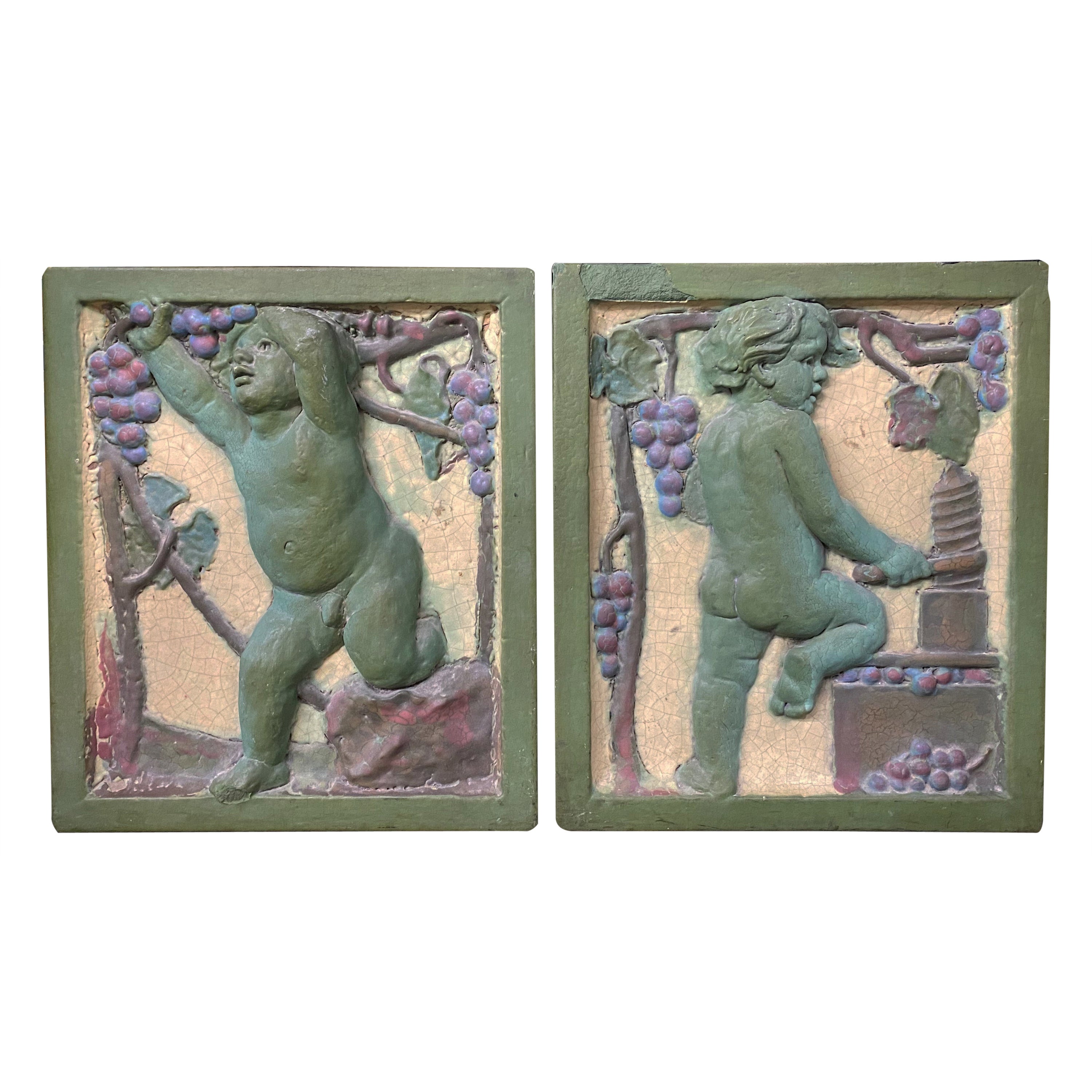 Pair of Early 20th Century Polychrome Putti Architectural Tiles with Grape Motif For Sale