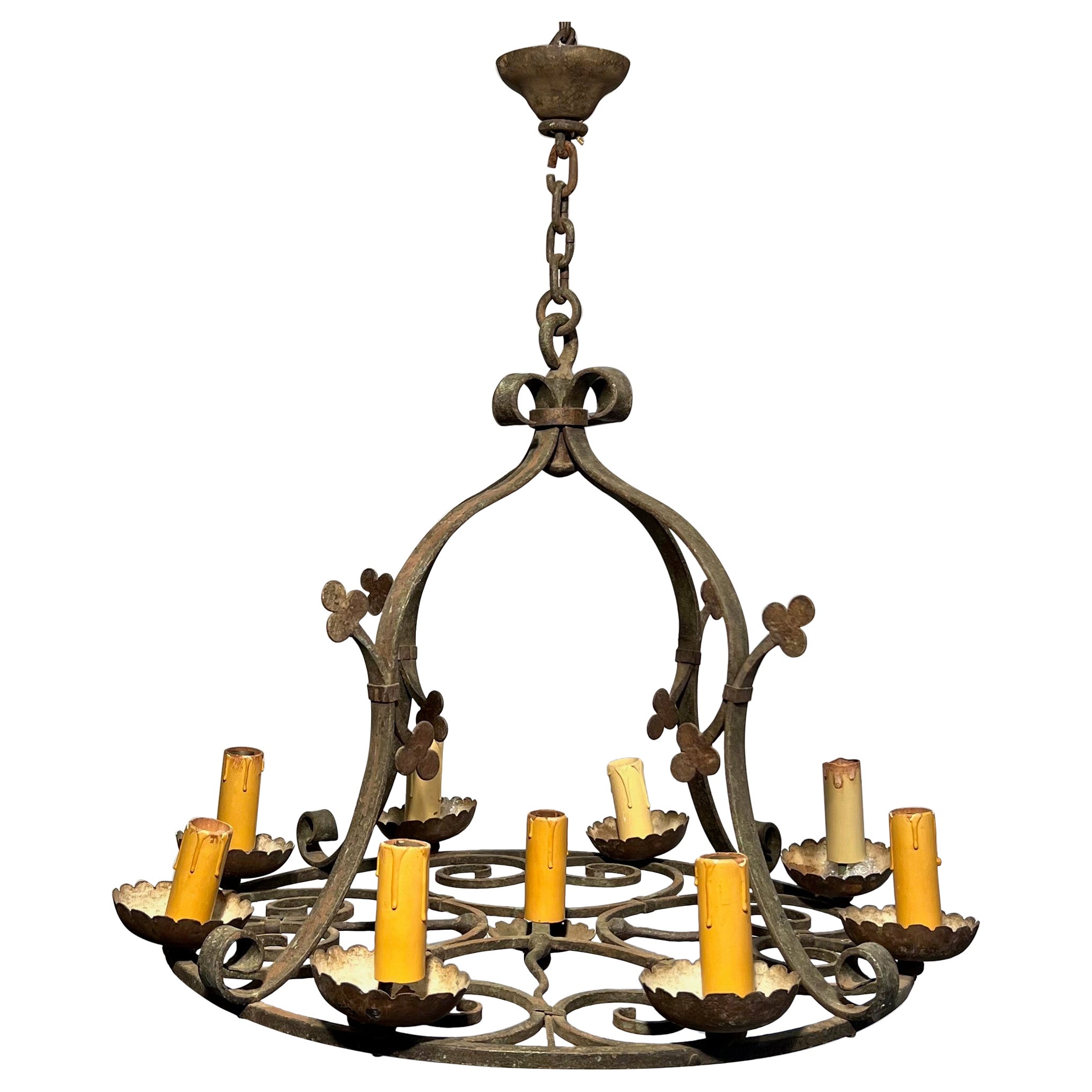 9 lights clover wrought iron chandelier. French work. Circa 1950