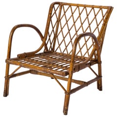 Vintage Mid-century Rattan Armchair by Jacques Quinet - France 1960's