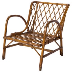 Fauteuil en rotin du milieu du siècle par Jacques Quinet, France, années 1960