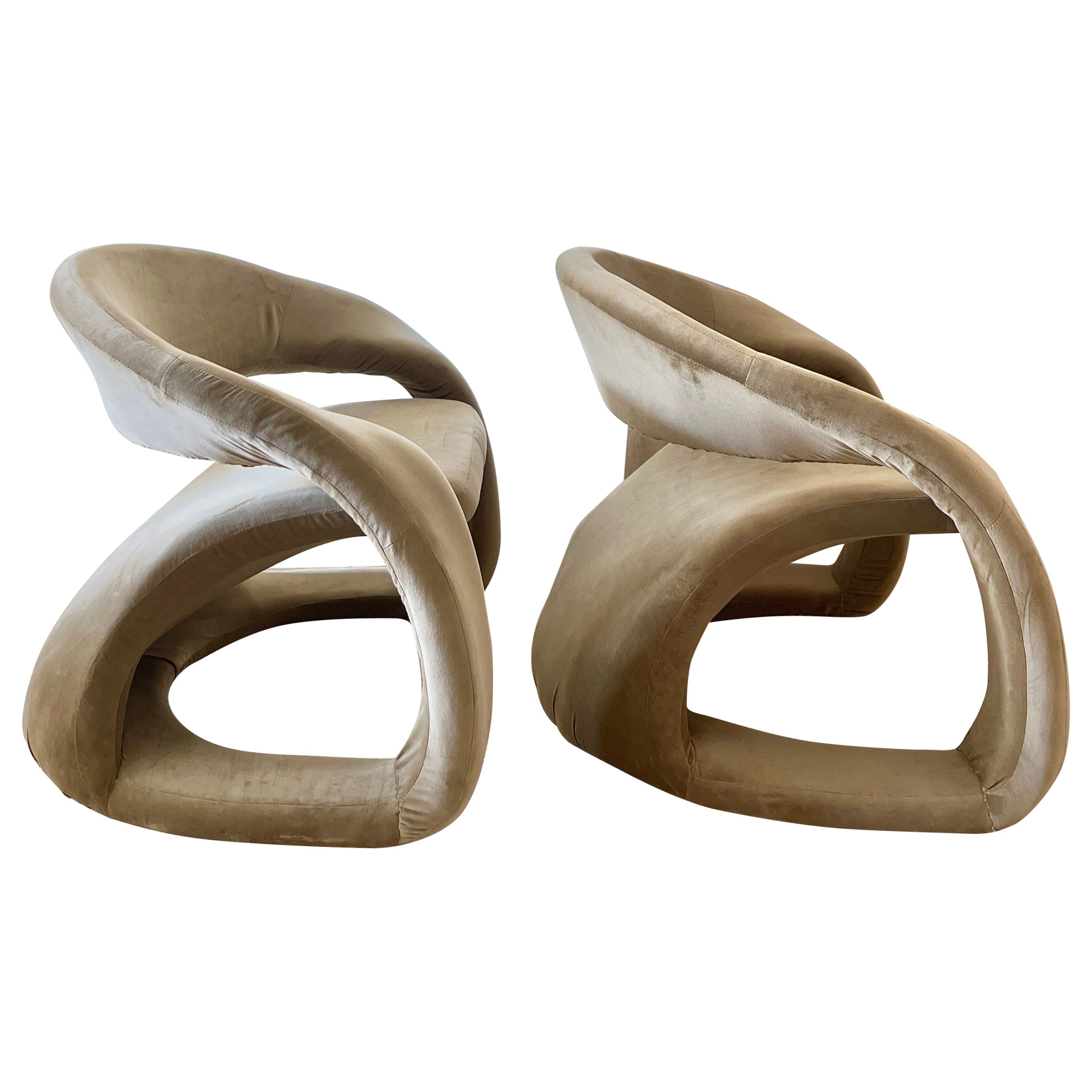 A pair of sculptural tongue chairs by Jaymar, circa 1980s. In sage green velvet