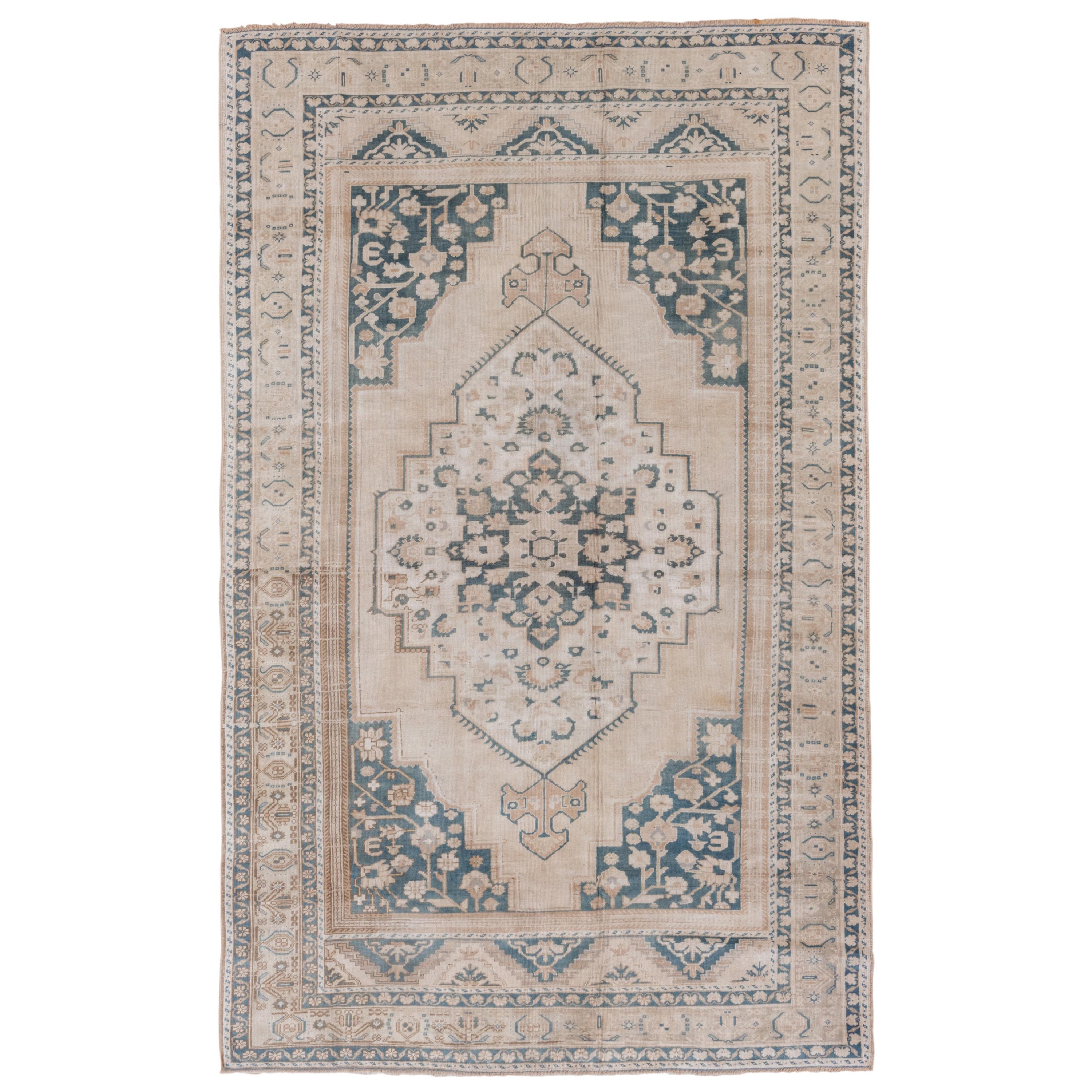 Vintage Handknotted Turkish Oushak Rug with a Neutral Palette and Green Accents For Sale