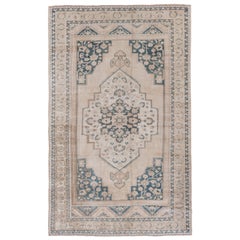 Vintage Handknotted Turkish Oushak Rug with a Neutral Palette and Green Accents