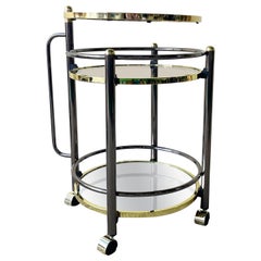 Hollywood Regency Gold and Charcoal Three Tear Mirrored Swivel Top Beverage Cart