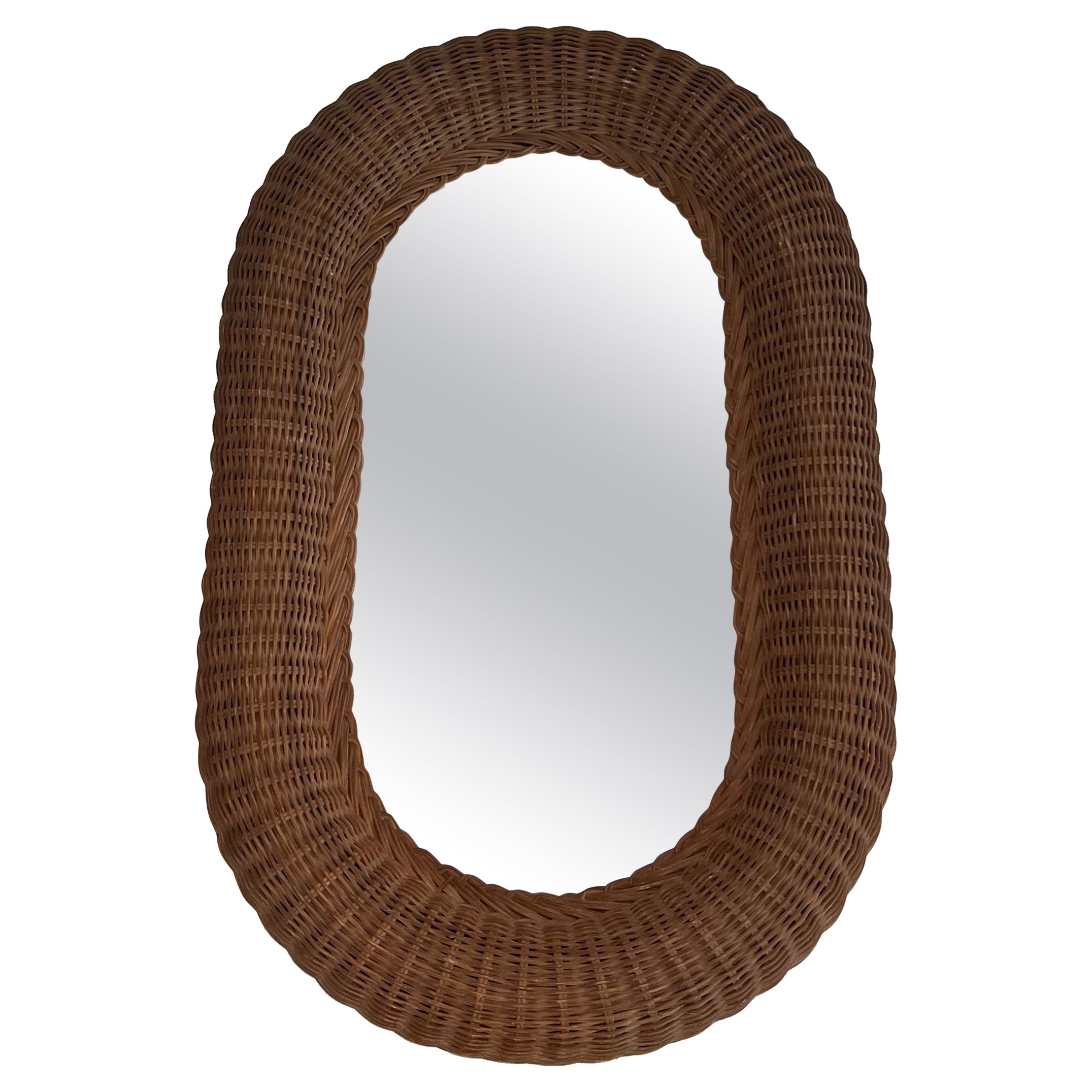 Oval rattan mirror. French work. Circa 1970 For Sale