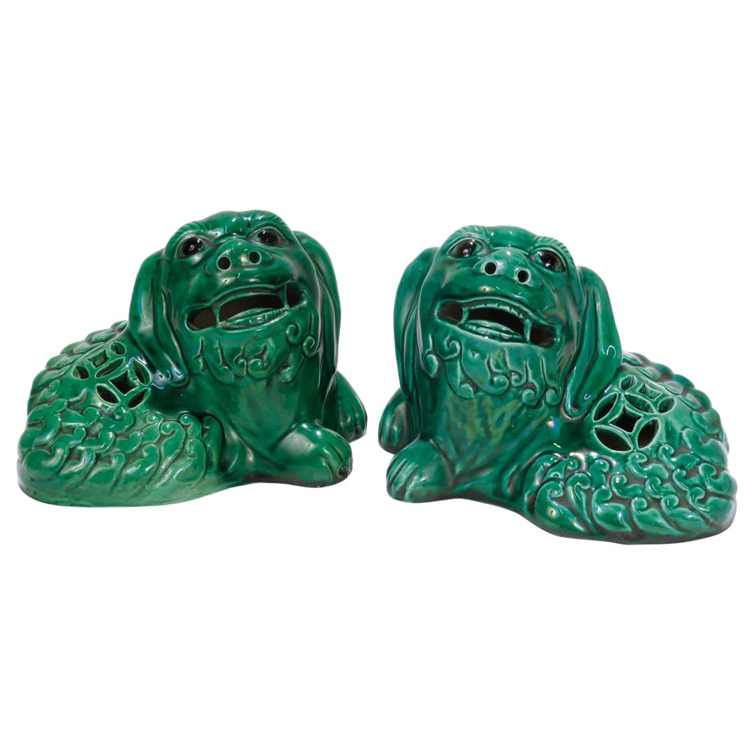 Pair of Chinese Green Glazed Pottery Recumbent Foo Dog Figurines For Sale