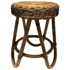 Vintage Rattan Stool. This is a French work. Circa 1950