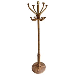 Vintage Rattan and Brass Coat rack on stand. French Work. Circa 1970
