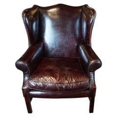 English country house Georgian style leather wing chair