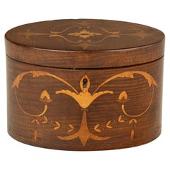 Used A harewood marquetry tea caddy with Royal Provenance