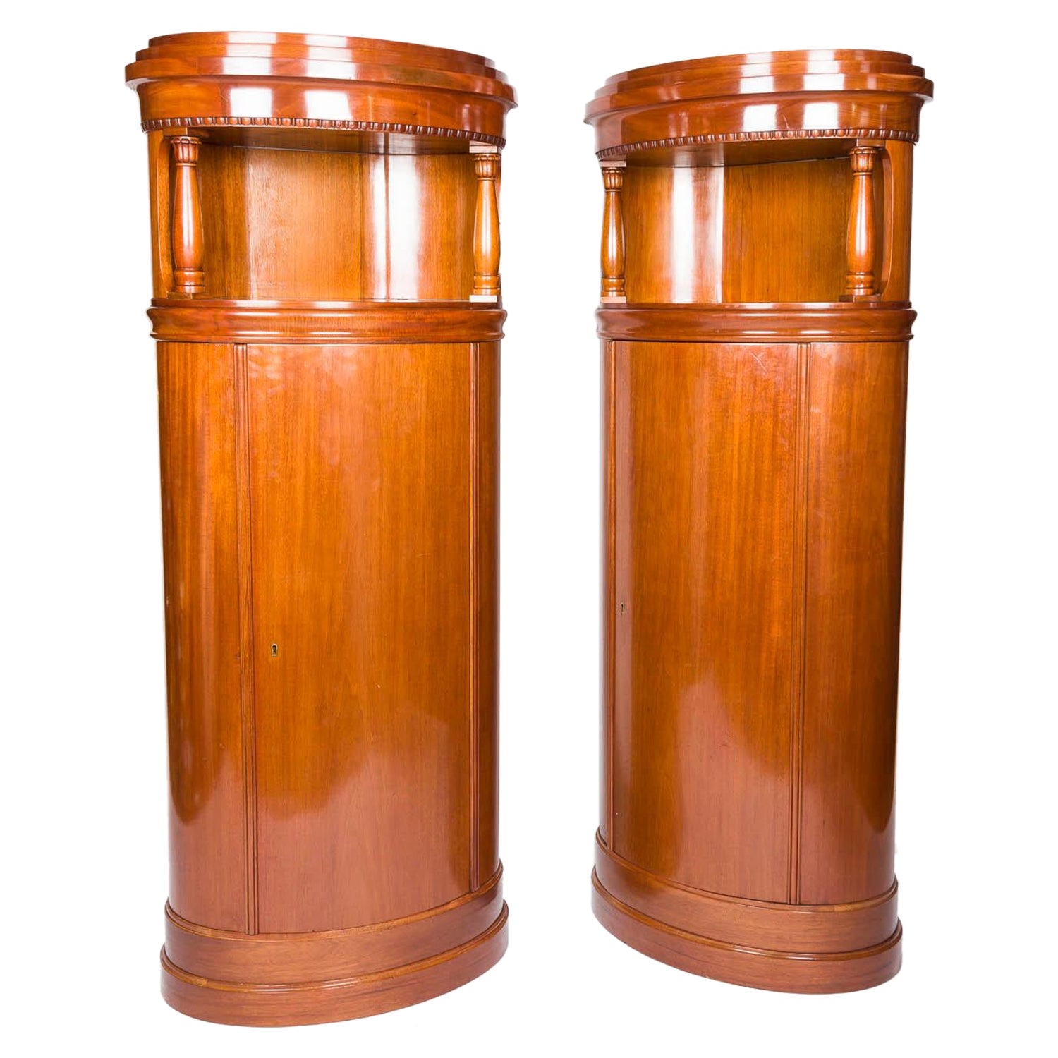 A pair of mahogany oval cabinets, Denmark, circa 1910. For Sale