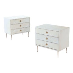 Pair parchment covered nightstands having three drawers