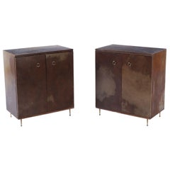 Pair parchment covered two door cabinets C 1950 having adjustable shelves 