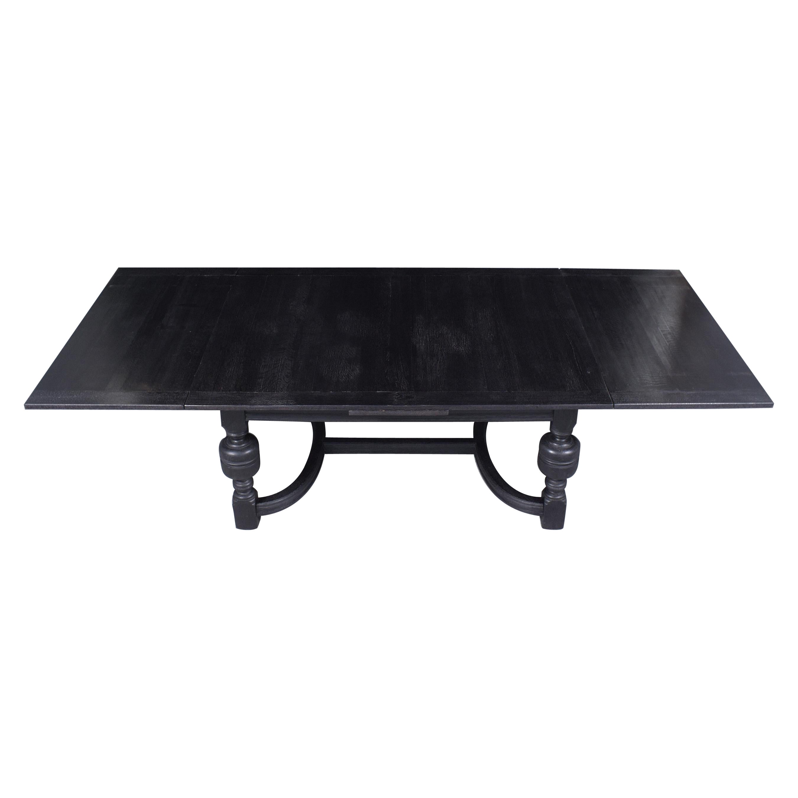 1850s Spanish Extendable Dining Table: Ebonized Solid Wood with French Design For Sale