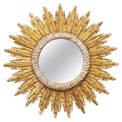 Miroir en étoile ou en soleil en or et argent doré (diamètre 27 1/2)