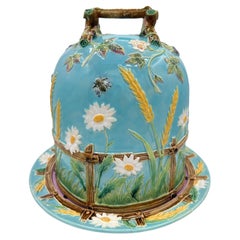 A Large George Jones Majolica Cheese Bell with Daisys, Bees and Fence, ca. 1878